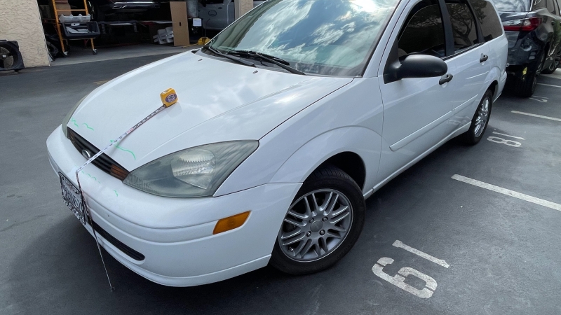 white car getting estimate white car getting estimate